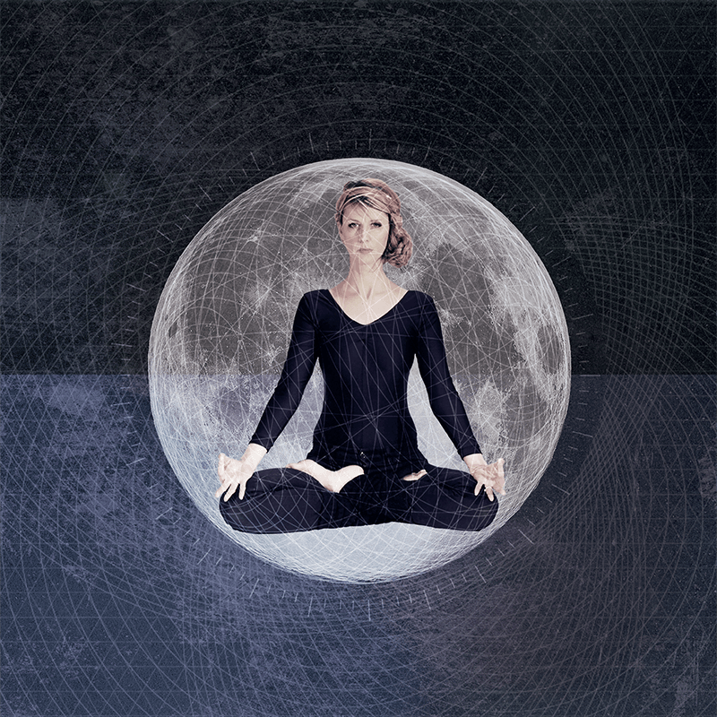 In-between book-your-warrior-guide - Julie Mcguire sits in a yoga pose